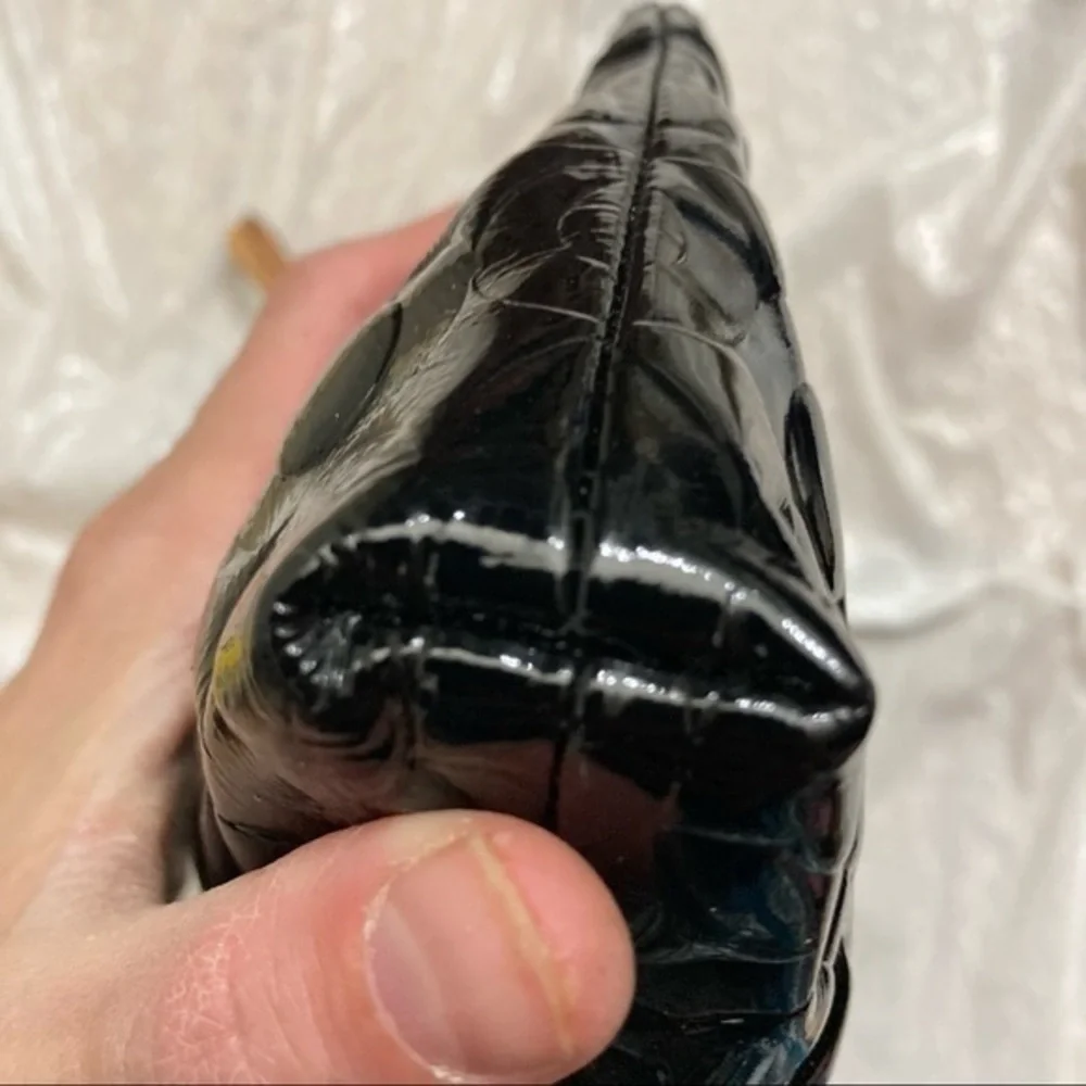 Coach embossed black patent leather op art wristlet bag